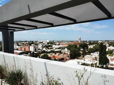 a view of the city from the roof of a house at Depto 1 dormitorio totalmente equipado in Cordoba