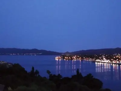 a view of a large body of water at night at Shakespeare 176 Ph3 in Villa Carlos Paz