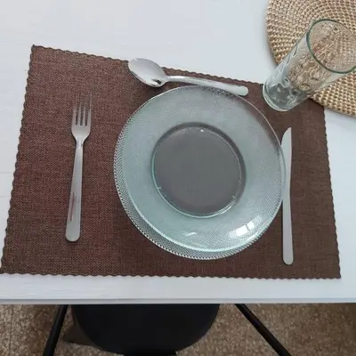 a plate and a fork and spoon on a table at Microcentro de la Docta in Cordoba