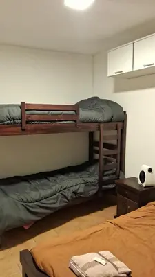 a room with two bunk beds in a room at pepesapart in Cordoba