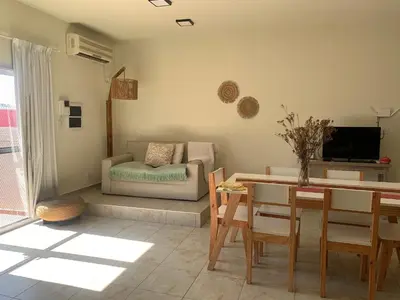 a living room with a couch and a table at Departamento Confortable 2 in Cordoba
