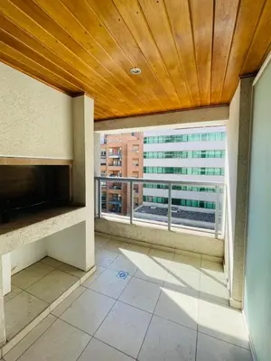 a room with a balcony with a view of a building at CATEGORIA departamento a dos cuadras del patio olmos 1 dormitorio asador pileta y cochera in Cordoba