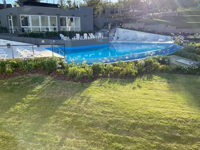 an overhead view of a swimming pool in a yard at Venetto Village in Villa Parque Siquiman