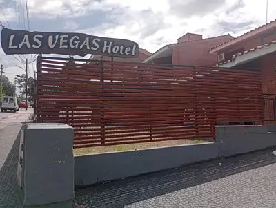a wooden fence in front of a las vegas hotel at Hotel Las Vegas in Villa Carlos Paz