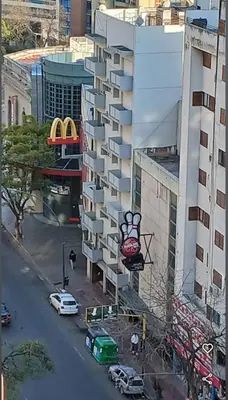 a building with a sign on the side of it at duplex13b in Cordoba