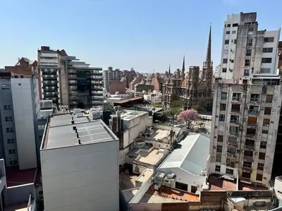 an aerial view of a city with tall buildings at Departamento para 6 personas in Cordoba
