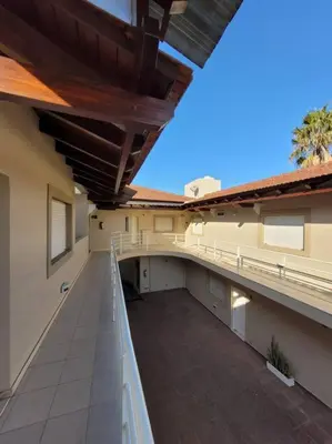 an empty balcony of a house with a roof at Departamento en Villa Carlos Paz in Villa Carlos Paz