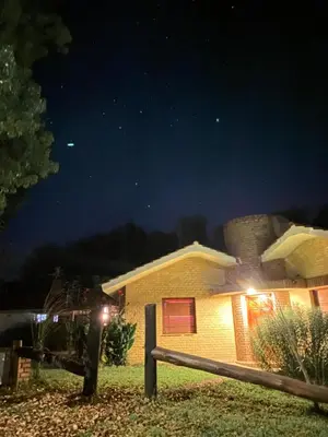 a house at night with the stars in the sky at Amplia casa a solo unos metros del centro - RentVGB in Villa General Belgrano