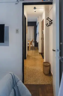 a hallway with a door leading to a room at Trejo 351 in Cordoba