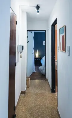 a hallway with a door leading to a bedroom at Trejo 351 in Cordoba