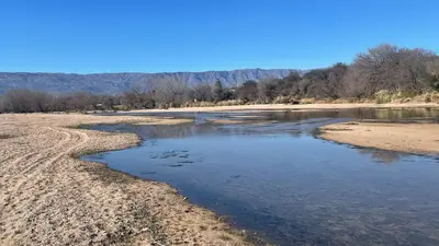 a view of a river from the shore at Duplex del Bosque - Solo Parejas in Mina Clavero