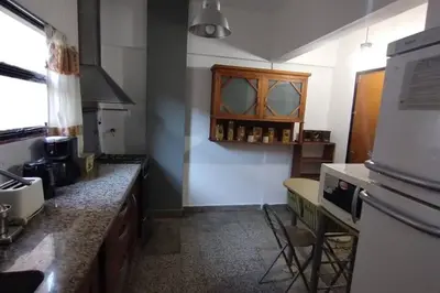 a kitchen with a sink and a counter top at Spacious bright apartment with garage in Cordoba in Cordoba