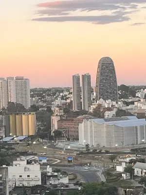 a city skyline with tall buildings in a city at Departamento en Nueva Cordoba in Cordoba