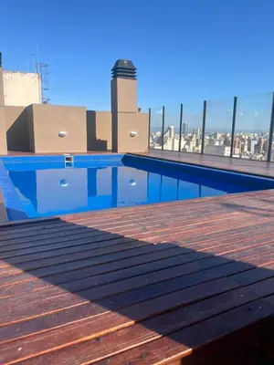 a swimming pool on the roof of a building at Departamento en Nueva Cordoba in Cordoba