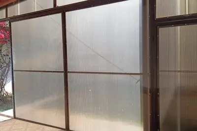 a sliding glass door of a building at departamento en zona residencial in Cordoba