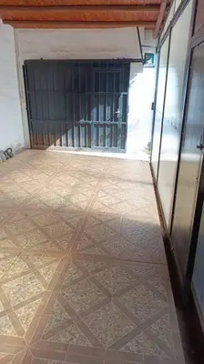 an empty room with a garage with a tiled floor at departamento en zona residencial in Cordoba