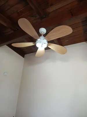 a ceiling fan is hanging from a ceiling at departamento en zona residencial in Cordoba