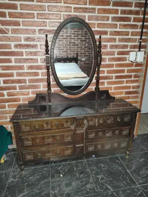 a dresser with a mirror on top of it at Amables 2 in Salsacate