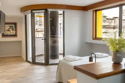 a kitchen with a glass shower in a room at Departamento 110 - Edificio VILAUT by INMOVE Temporarios in Cordoba