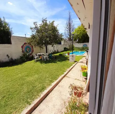 a view of a yard from a house at Departamento Nini Villa Del Dique in Villa del Dique