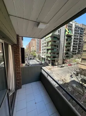 an empty balcony with a view of a city at Rondeau Suite in Cordoba