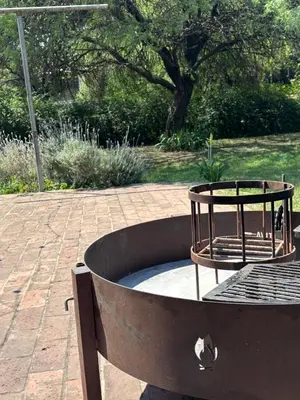 a bird bath with a bird cage in it at Anastasia Rústica y acogedora in Cordoba