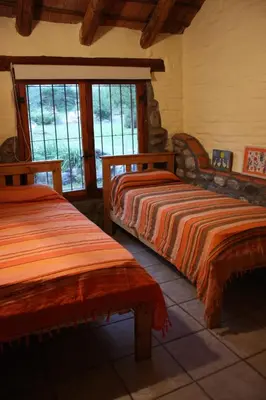 a bedroom with two beds and a window at Cielito Lindo in San Javier
