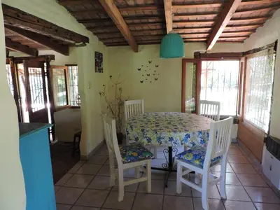 a dining room with a table and two chairs at Cielito Lindo in San Javier