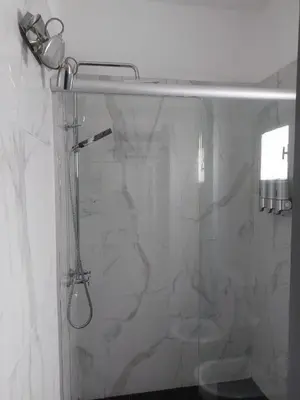 a shower in a bathroom with a shower curtain at RaGi dpto 3 in Cordoba