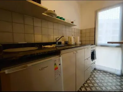 a kitchen with a sink and a dishwasher at Gran Ubicacion Centro in Cordoba