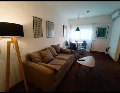 a living room with a couch and a table at Gran Ubicacion Centro in Cordoba