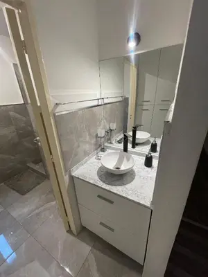 a bathroom with a sink and a mirror at Depto carlos paz in Villa Carlos Paz