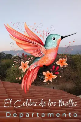 a painting of a humming bird on a wall at El Colibrí de los Molles in Los Molles