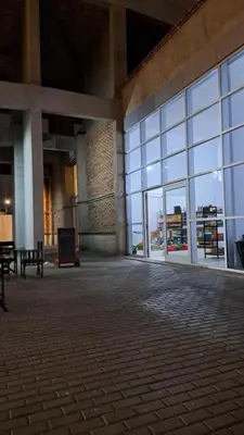 an empty lobby of a building with large windows at Cordoba Costanera 2 dormitorios con estacionamiento in Cordoba