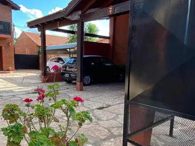 a reflection of a car parked in a garage at La Cantata in Merlo