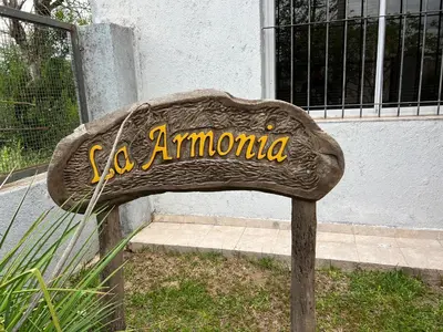 a sign that says ga amaho in front of a building at La Armonía in Potrero de Garay
