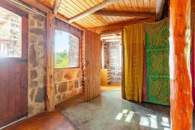 an empty room with a door and a window at Habitaciones individuales en La Llave in San Javier