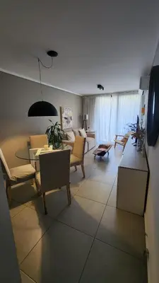 a living room with a couch and a table at Departamento -Brasil- Pleno Nueva Cordoba By Apartcba in Cordoba