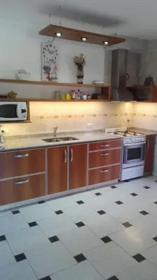 a kitchen with a sink and a stove in it at chalet la granadilla in Cerro de Oro