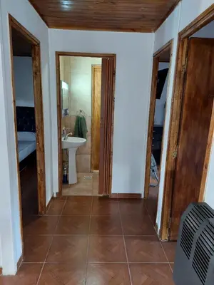 a room with a bathroom with a sink and a mirror at La soñada in San Antonio de Arredondo