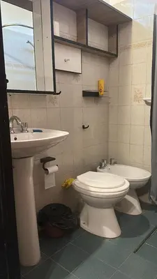 a bathroom with a toilet and a sink at Montecielo in San Antonio de Arredondo