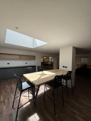 a dining room with a table and chairs at Departamento amoblado con Amenities 104 INVERHOME INMOBILIARIA in Cordoba