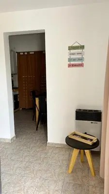 a room with a table with a record player on it at 760 C Apartamentos in Alta Gracia