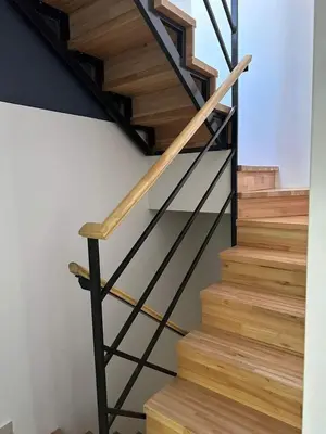 a metal and wood staircase in a house at Miralejos 17 in Villa Carlos Paz