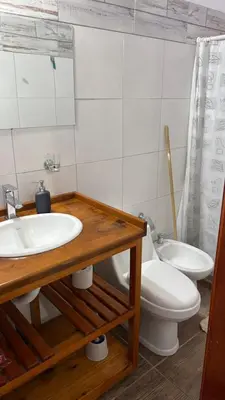 a bathroom with a sink and a toilet at Eurotrip in Mina Clavero