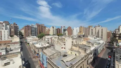 an aerial view of a city with tall buildings at MONOAMBIENTE VILAUT Temporario in Cordoba