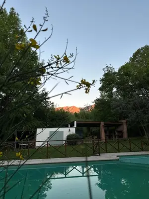 a view of a house and a swimming pool at Cabañas Los Hornillos de Juli y Marce in Los Hornillos