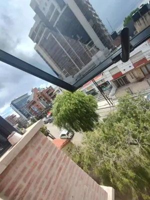 a view from a window of a city with buildings at Torre Roca in Villa Carlos Paz