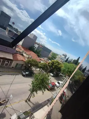 a view from a window of a street with cars at Torre Roca in Villa Carlos Paz