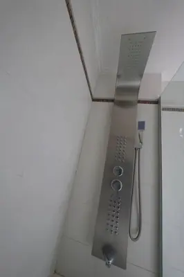 a shower in a bathroom with a shower at Perfect location Apartment in Nva Cba in Cordoba